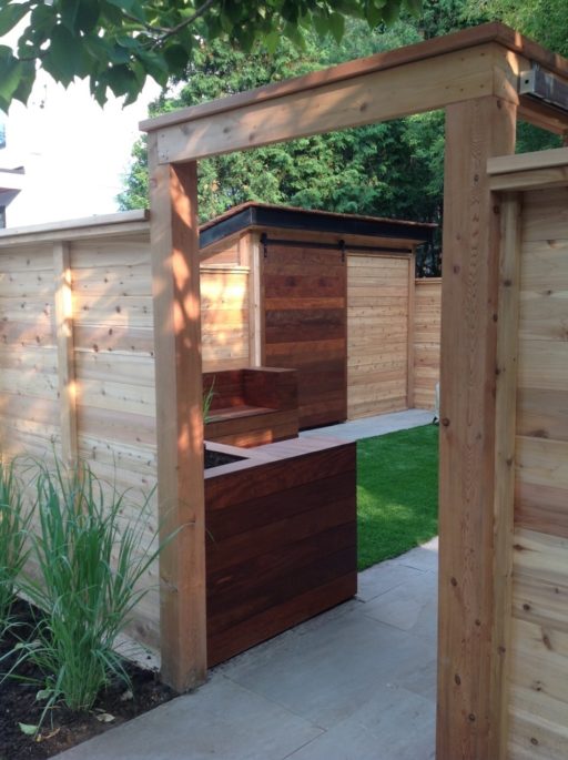 Cedar fence with IPE Barn door in background