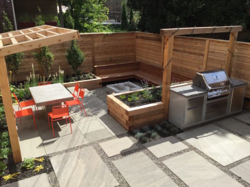 Design Build - Oversize flagstone slabs, outdoor kitchen, IPE bench with fire pit