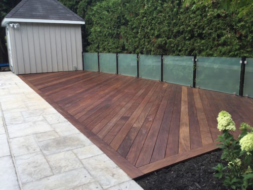 IPE deck with smoked glass railing